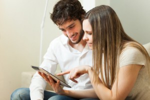 Couple using a tablet